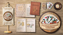 Werbemittel für Tucher Initiative „Schafkopf-freundliche Gastronomie“: Außenschild, Spielkarten, Zahlteller, Schafkopffibel, Stammtisch-Wimpel