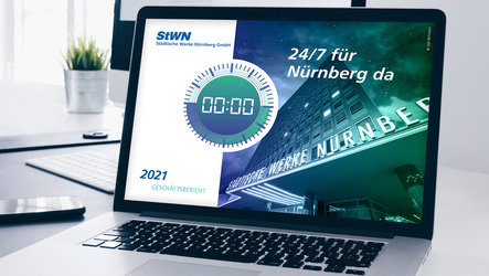 Laptop Bildschirm mit Vorschau auf STWN Geschäftsbericht 2022 in grün/blau